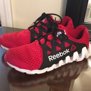 Red and black Reebok men's size 7 tennis shoes